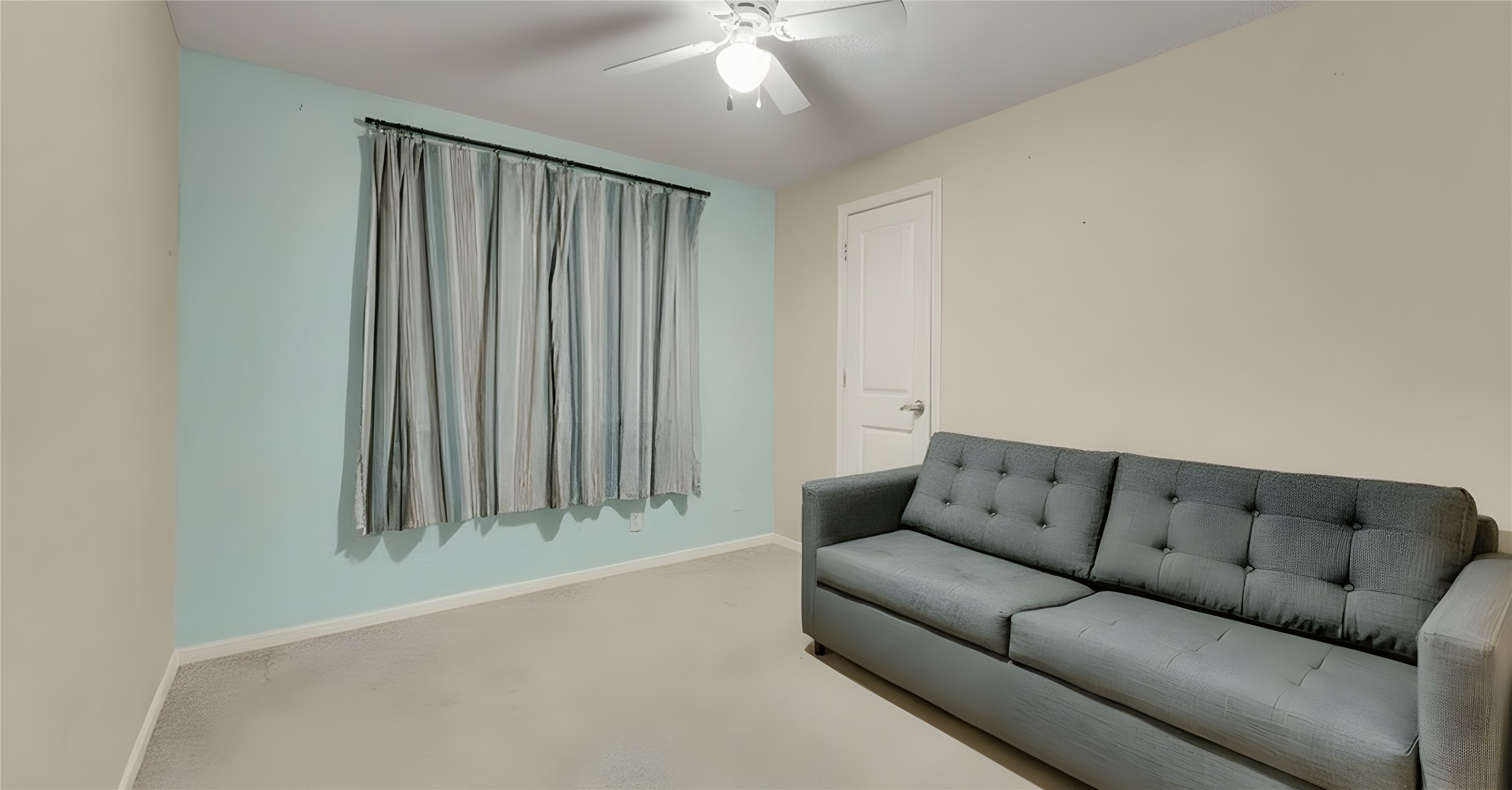 9111 Hazelhurst Drive Austin, TX 78729 - Photo 11 of 13 a living room with furniture and a chandelier