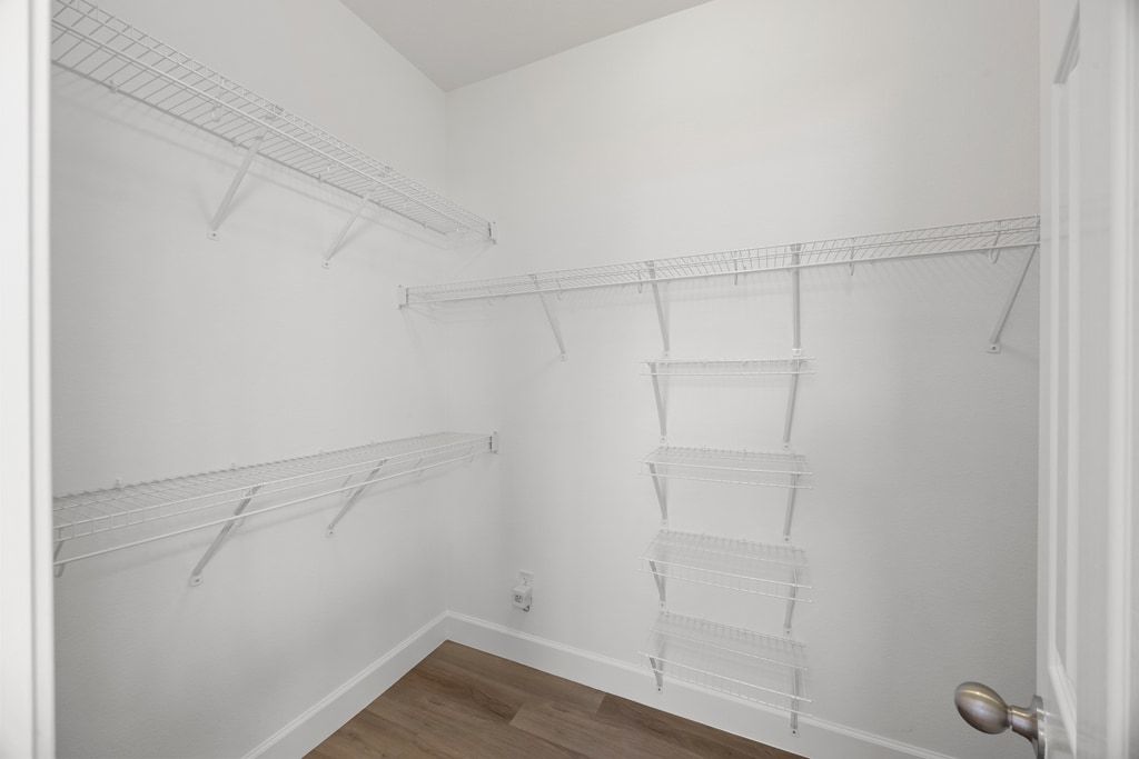 14815 Avery Ranch Boulevard, Unit 1701 Austin, TX 78717 - Photo 19 of 24 a view of a room with racks on the wall