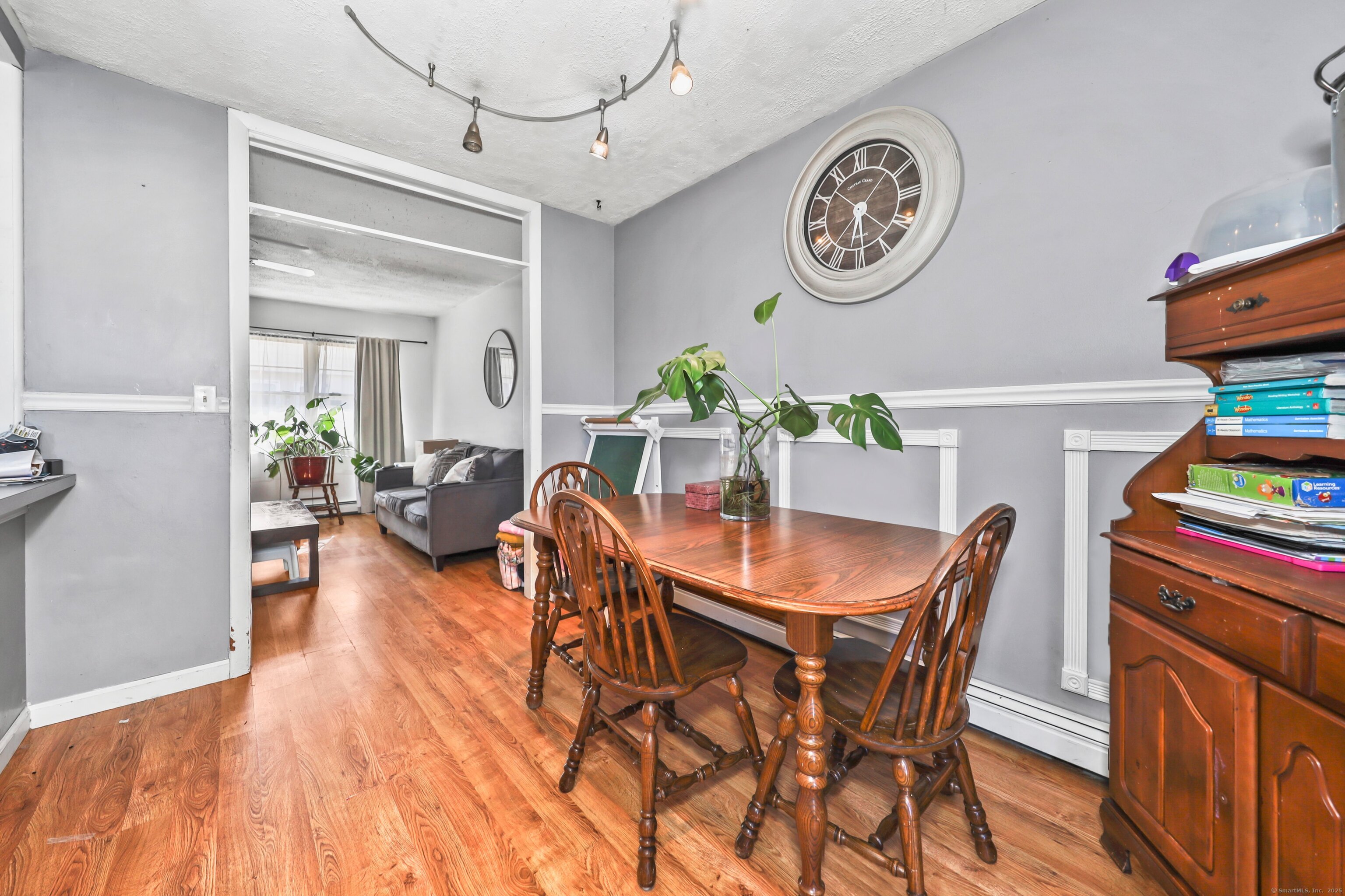 40 Ridge Road, Unit 3 Naugatuck, CT 06770 - Photo 4 of 15 a view of a dining room with furniture and a table