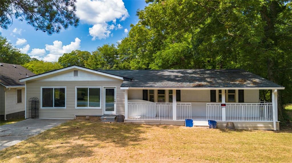 2275 Camp Ground Road Southwest Atlanta, GA 30331 - Photo 1 of 1 a view of a house with a patio