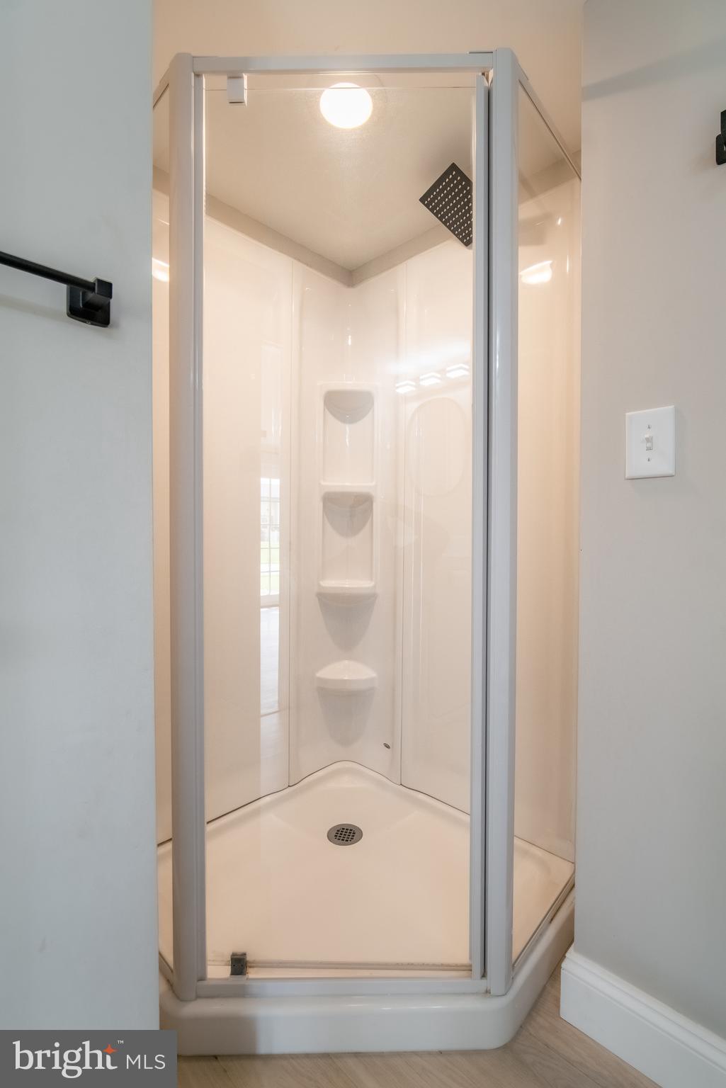 907 Marbrook Lane York, PA 17404 - Photo 22 of 33 a bathroom with a glass shower door