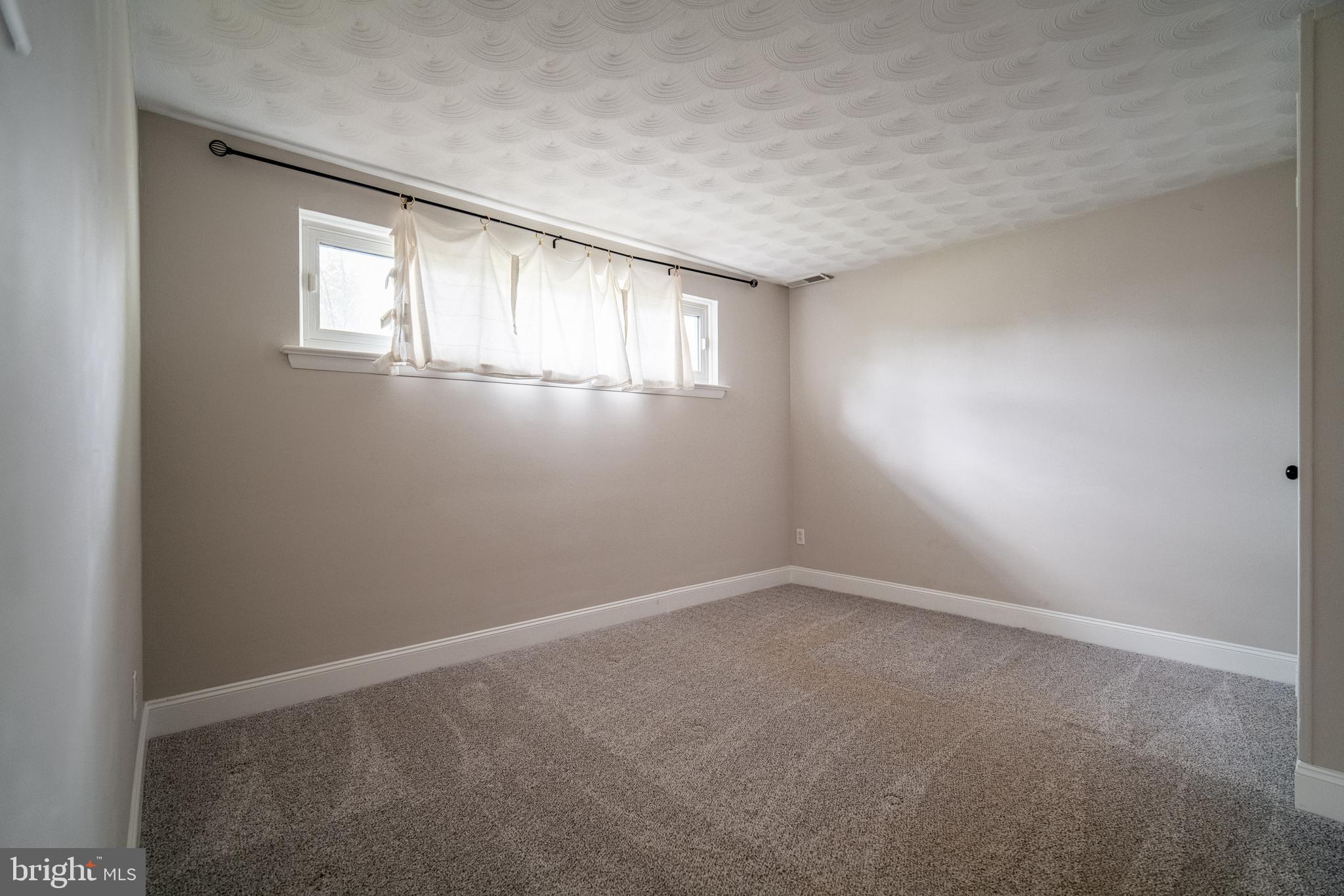 907 Marbrook Lane York, PA 17404 - Photo 26 of 33 an empty room with windows