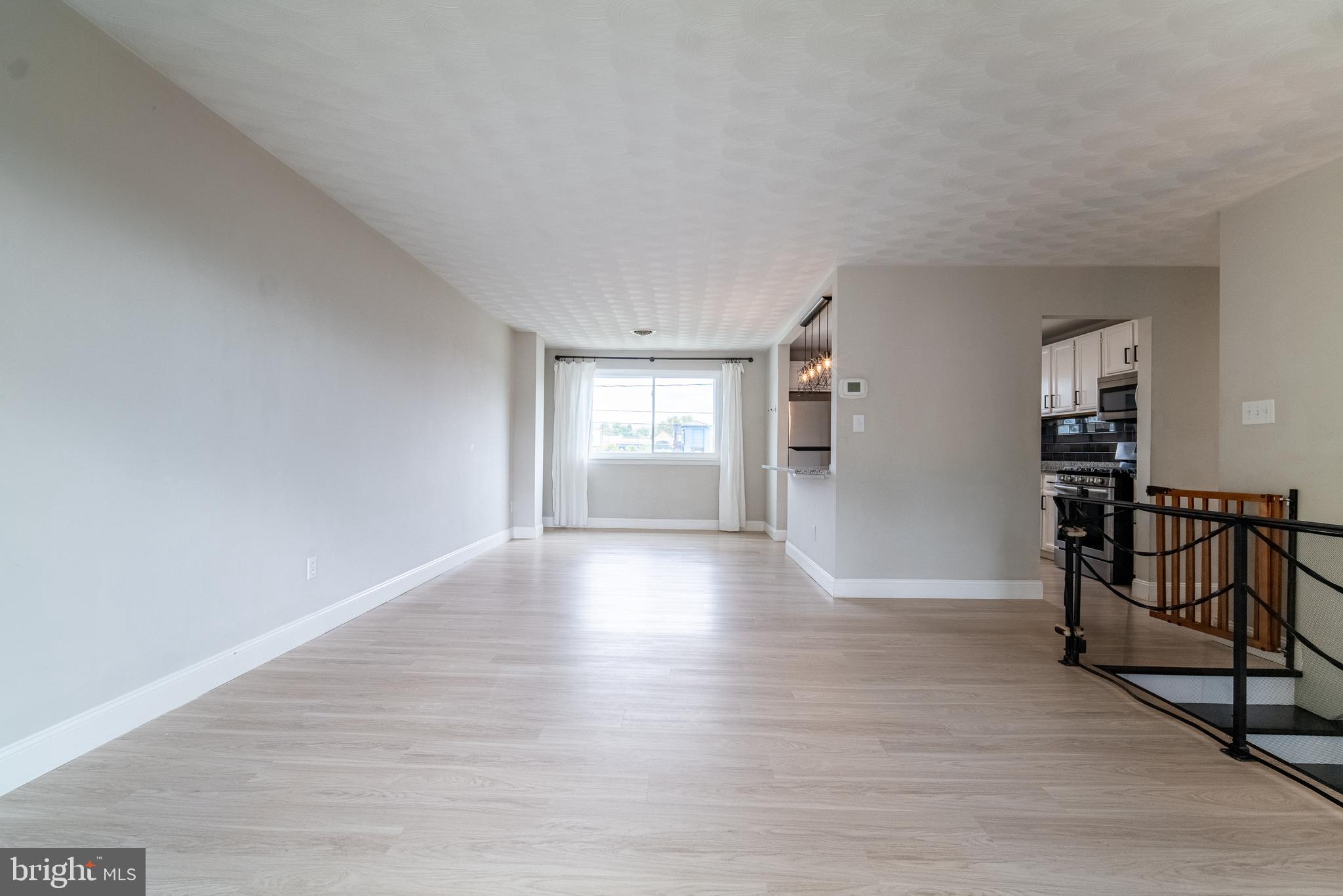 907 Marbrook Lane York, PA 17404 - Photo 5 of 33 a view of empty room with wooden floor and fan