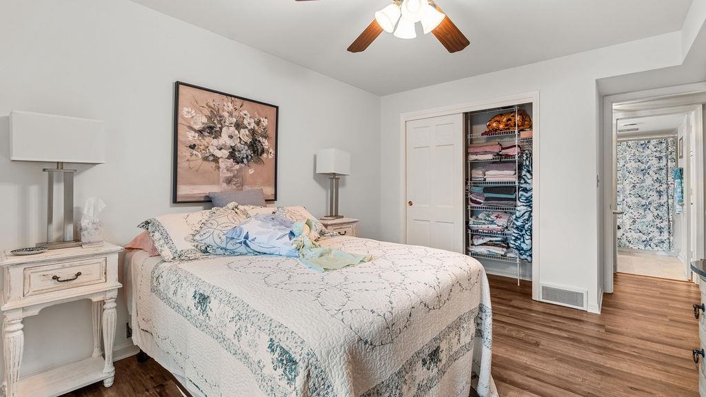 5548 Spring Brook Road, Unit 310 Rockford, IL 61114 - Photo 22 of 41 a bedroom with a bed and a flat screen tv