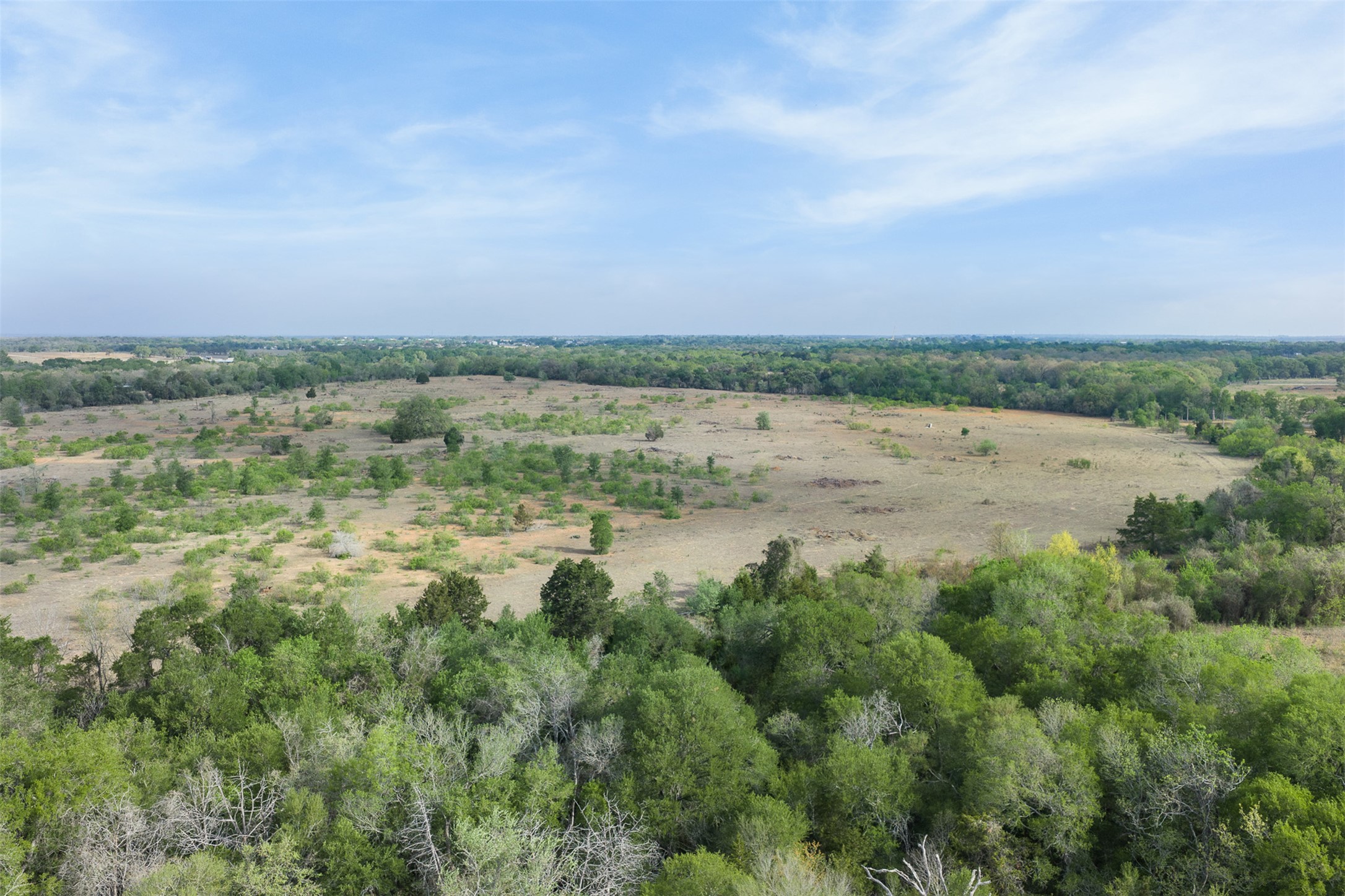 579 Lower Elgin Road Elgin, TX 78621 - Photo 10 of 40 a view of a lake with a city