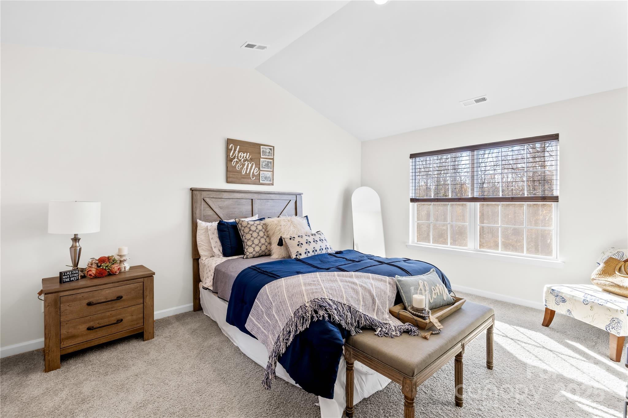 2721 Waybrook Drive Dallas, NC 28034 - Photo 19 of 33 a bedroom with a bed and a window
