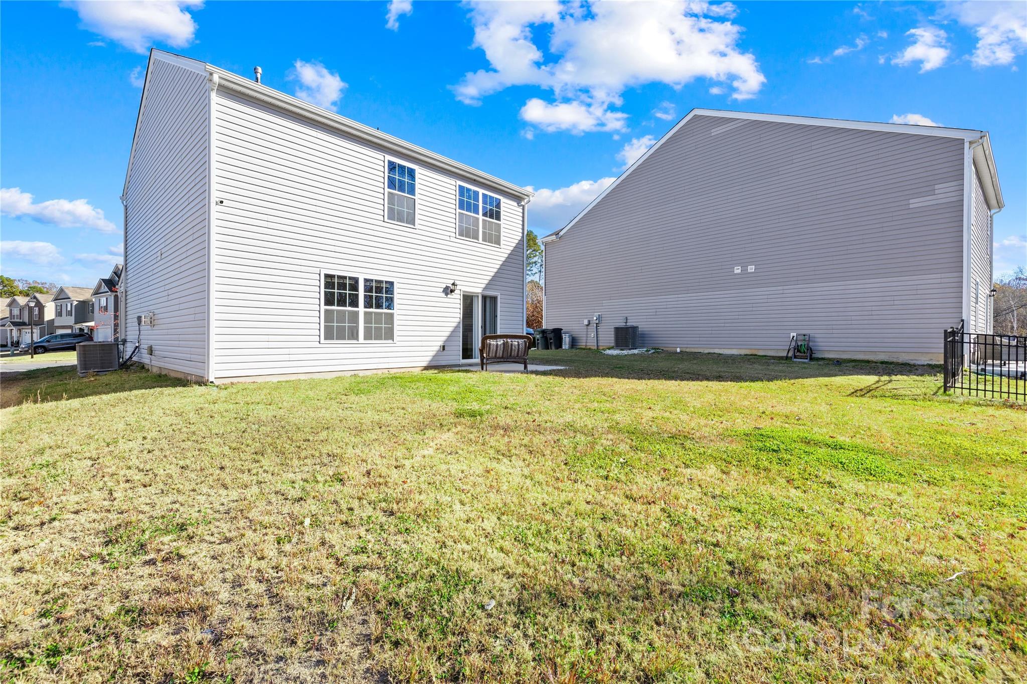 2721 Waybrook Drive Dallas, NC 28034 - Photo 25 of 33 a view of a house with a yard and garage