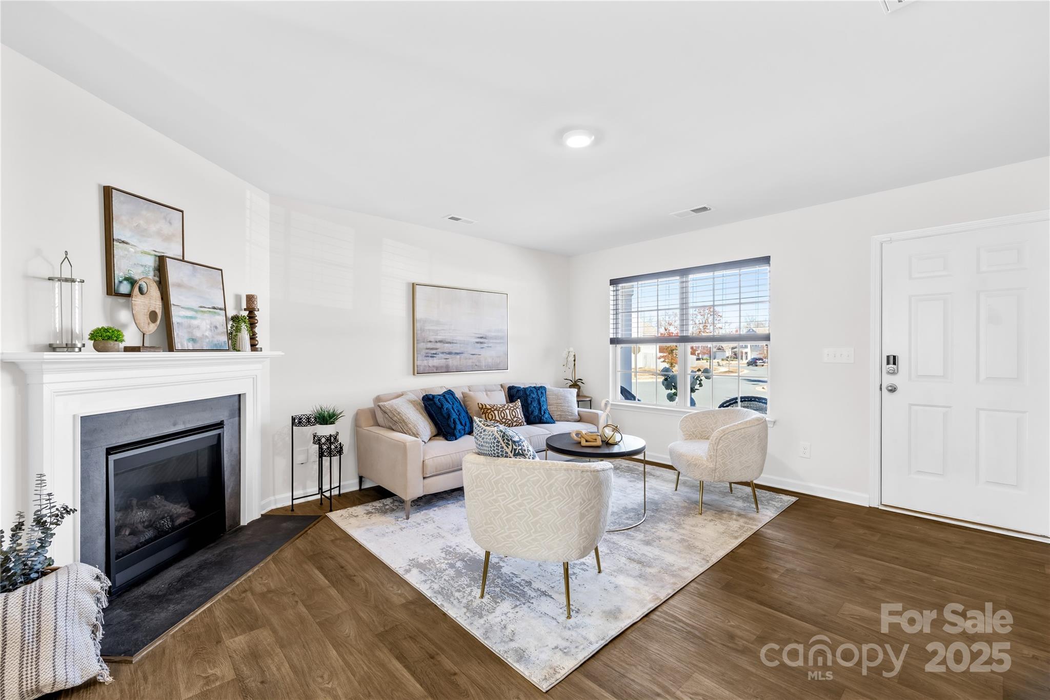 2721 Waybrook Drive Dallas, NC 28034 - Photo 3 of 33 a living room with furniture and a fireplace
