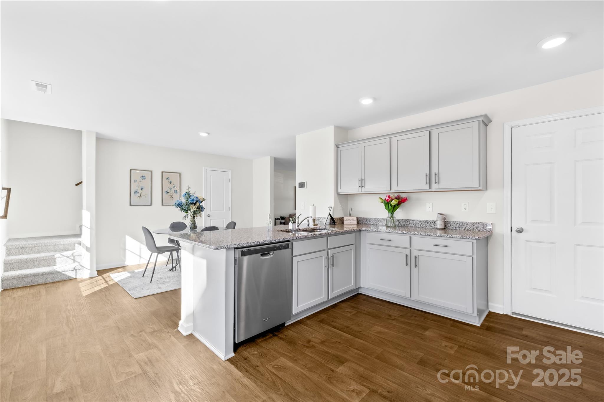 2721 Waybrook Drive Dallas, NC 28034 - Photo 8 of 33 a kitchen with cabinets and window