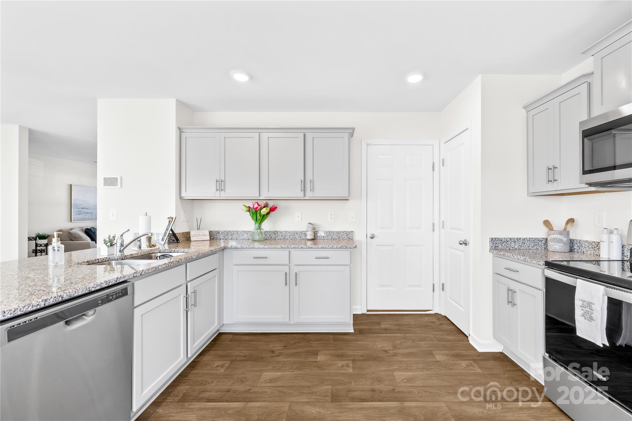 2721 Waybrook Drive Dallas, NC 28034 - Photo 9 of 33 a kitchen with a sink stove and cabinets
