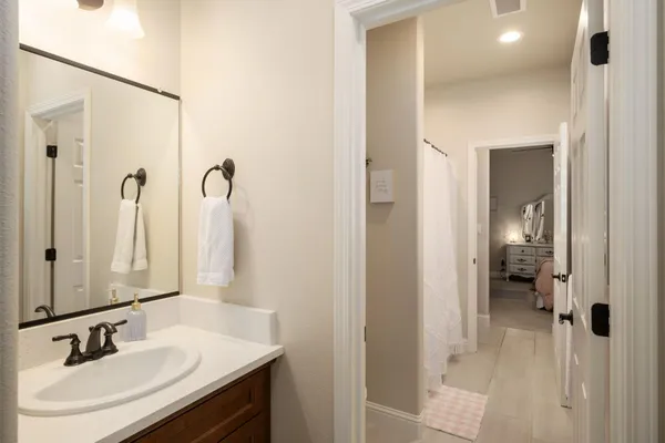 a bedroom with a bed and a cabinets