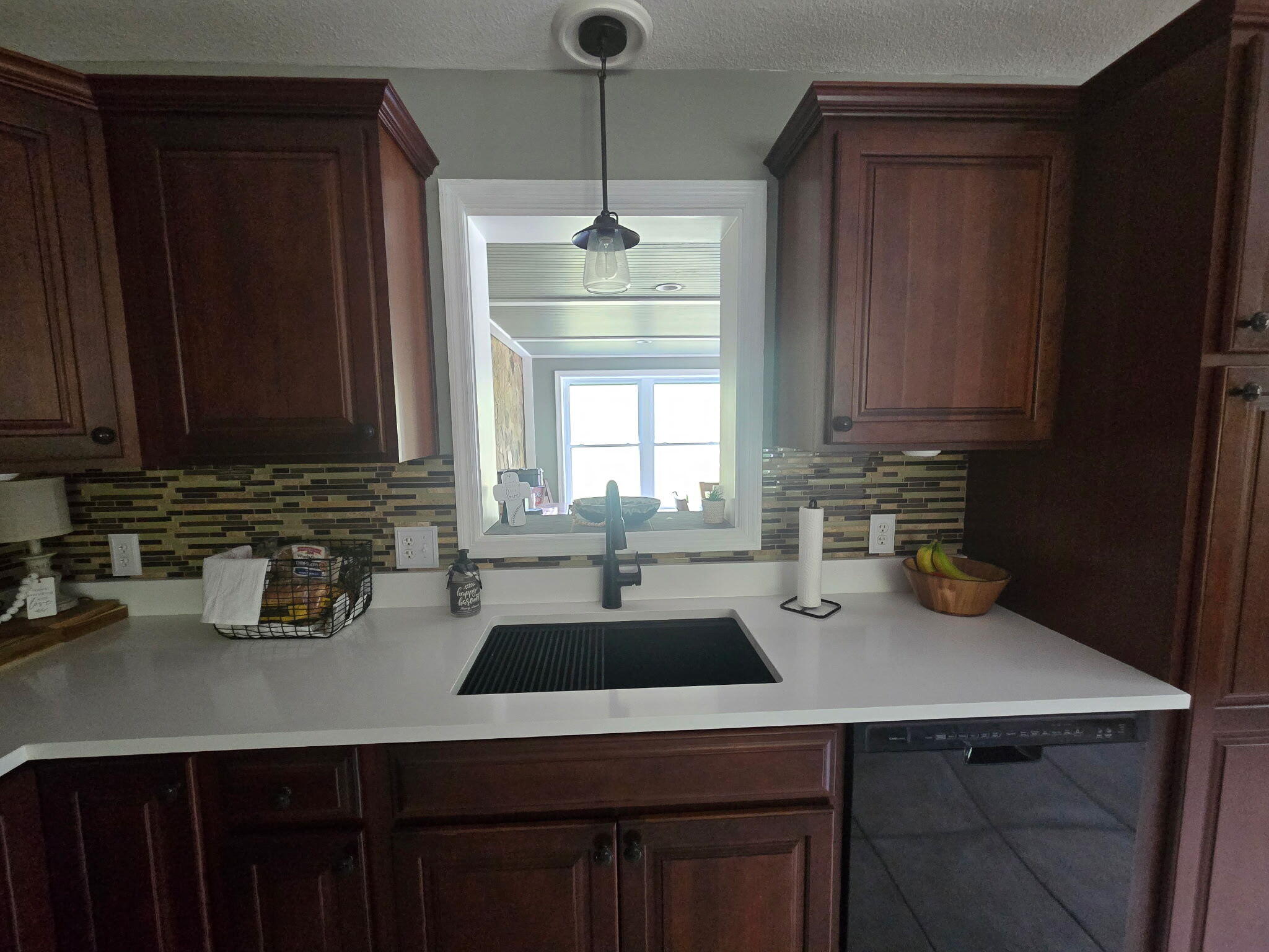 4003 Webbs Mill Road North Riner, VA 24149 - Photo 20 of 70 a kitchen with a sink a window and cabinets