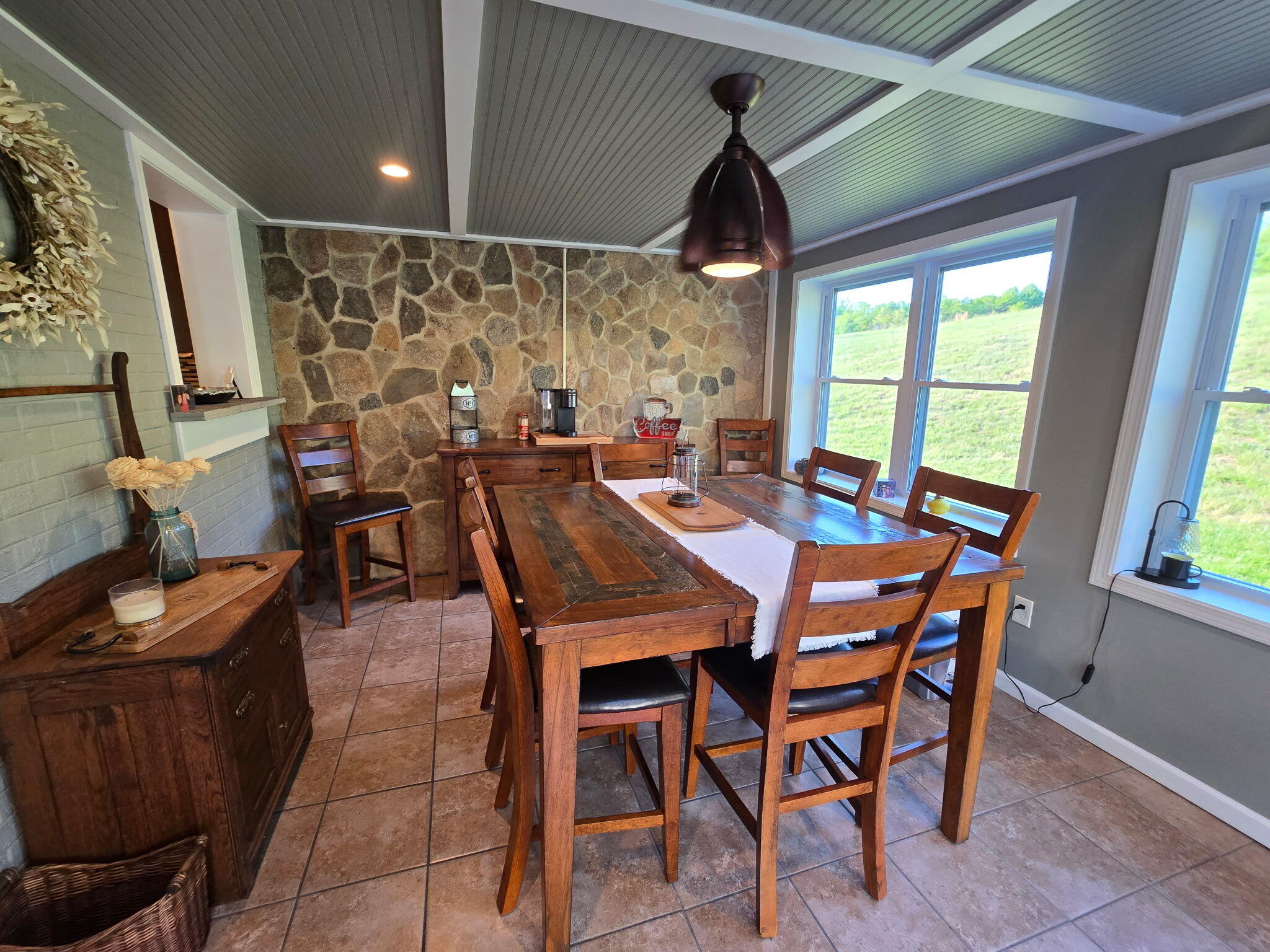 4003 Webbs Mill Road North Riner, VA 24149 - Photo 23 of 70 a view of a dining room with furniture window and outside view