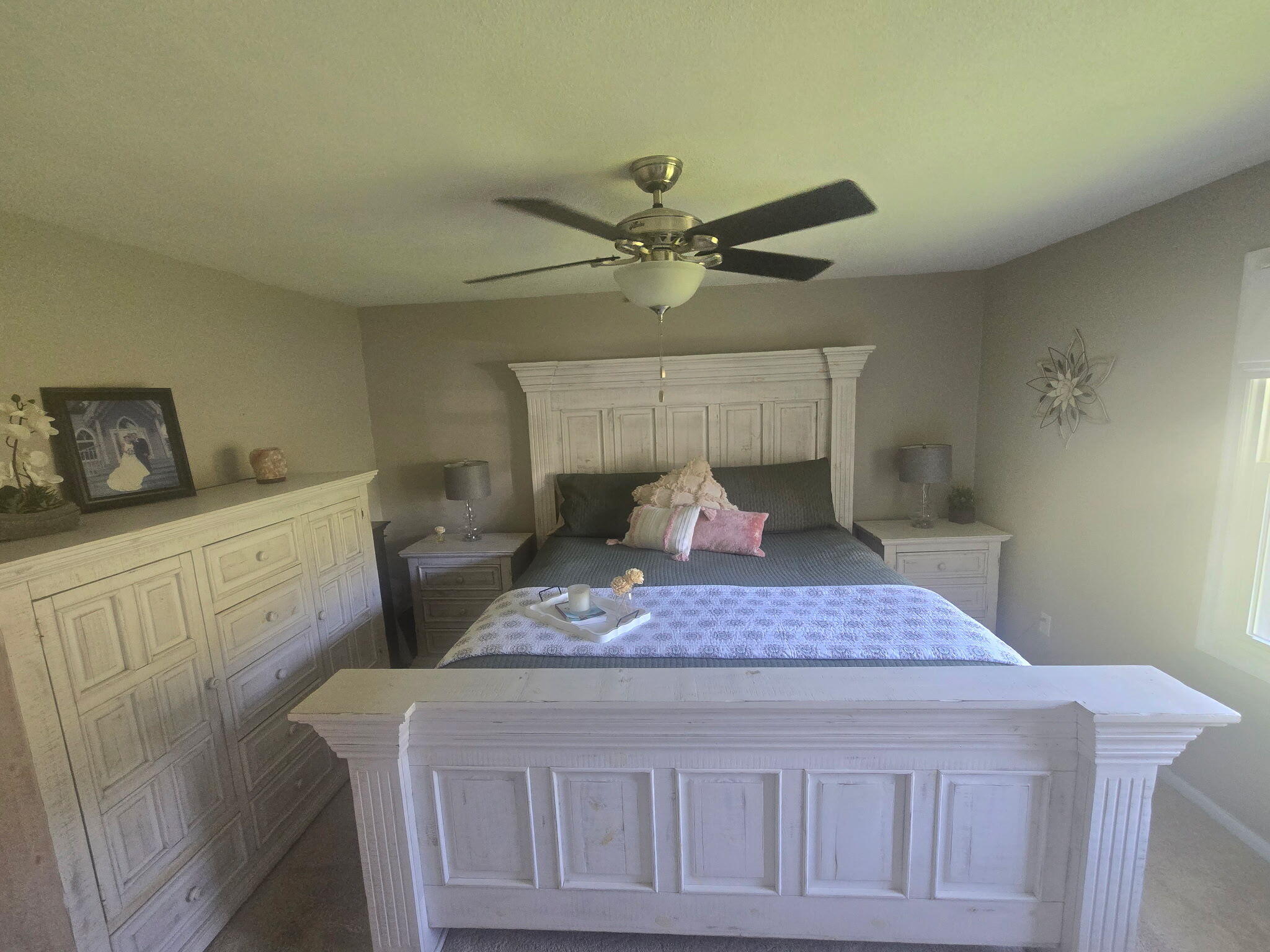 4003 Webbs Mill Road North Riner, VA 24149 - Photo 26 of 70 a bedroom with a bed and a chandelier