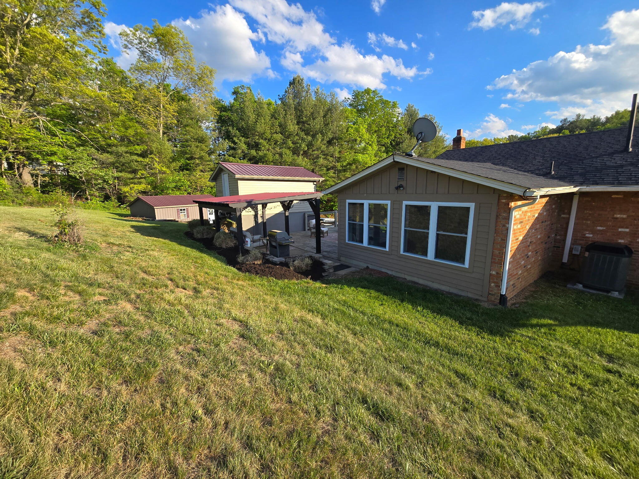 4003 Webbs Mill Road North Riner, VA 24149 - Photo 3 of 70 a view of a house with a yard