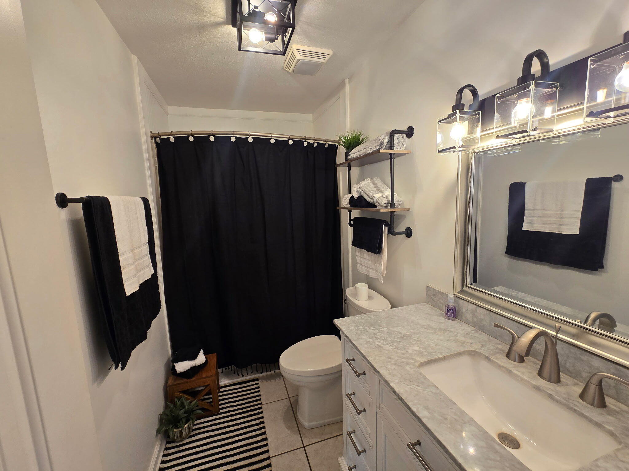 4003 Webbs Mill Road North Riner, VA 24149 - Photo 33 of 70 a bathroom with a sink a toilet and shower