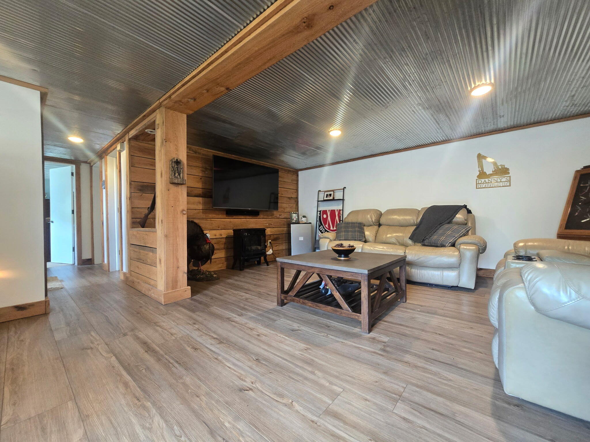 4003 Webbs Mill Road North Riner, VA 24149 - Photo 38 of 70 a living room with furniture and a flat screen tv