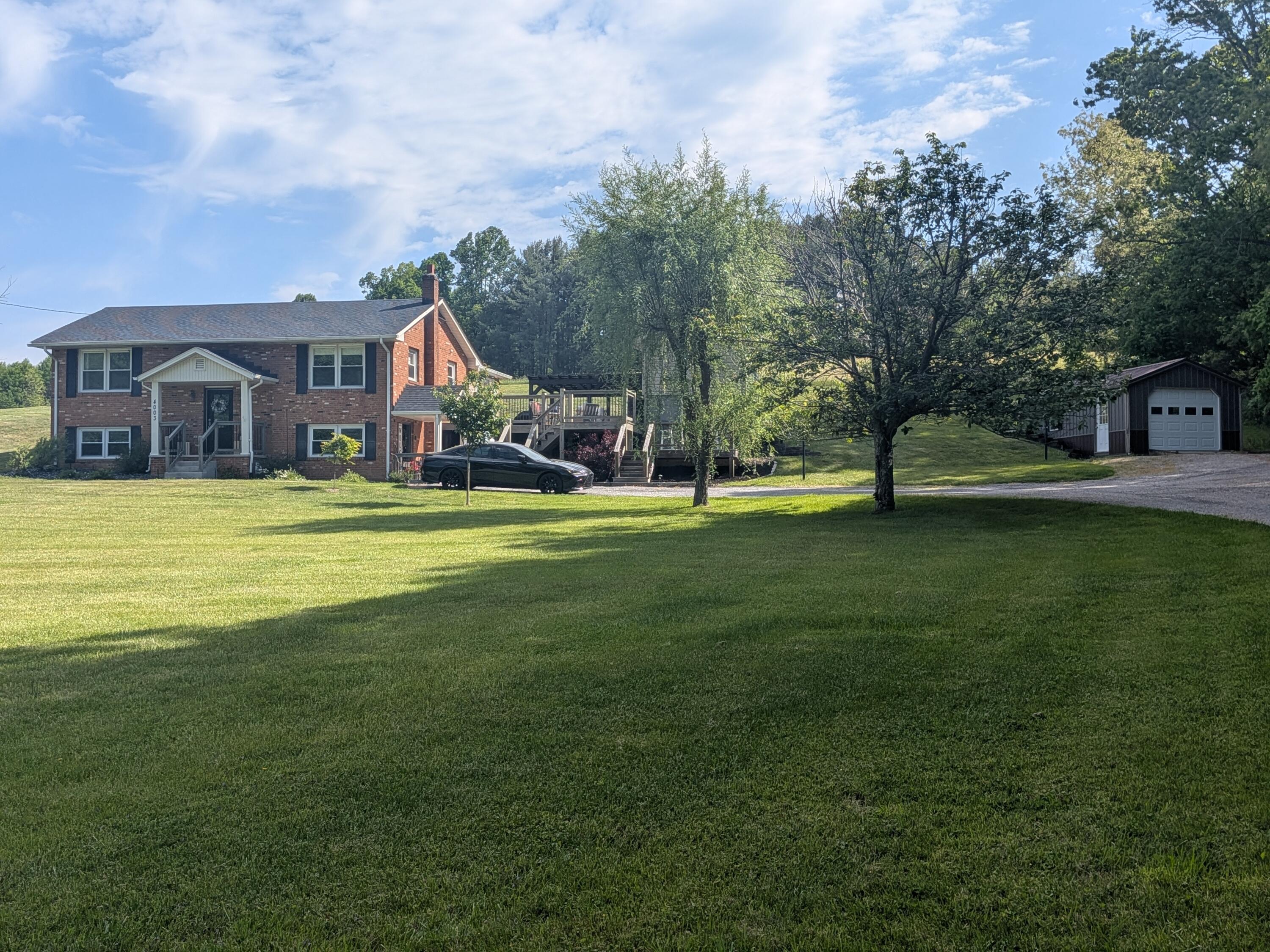 4003 Webbs Mill Road North Riner, VA 24149 - Photo 65 of 70 a view of a house with a big yard