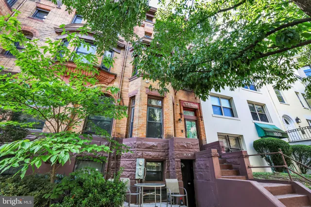 a front view of a multi story residential apartment buildings