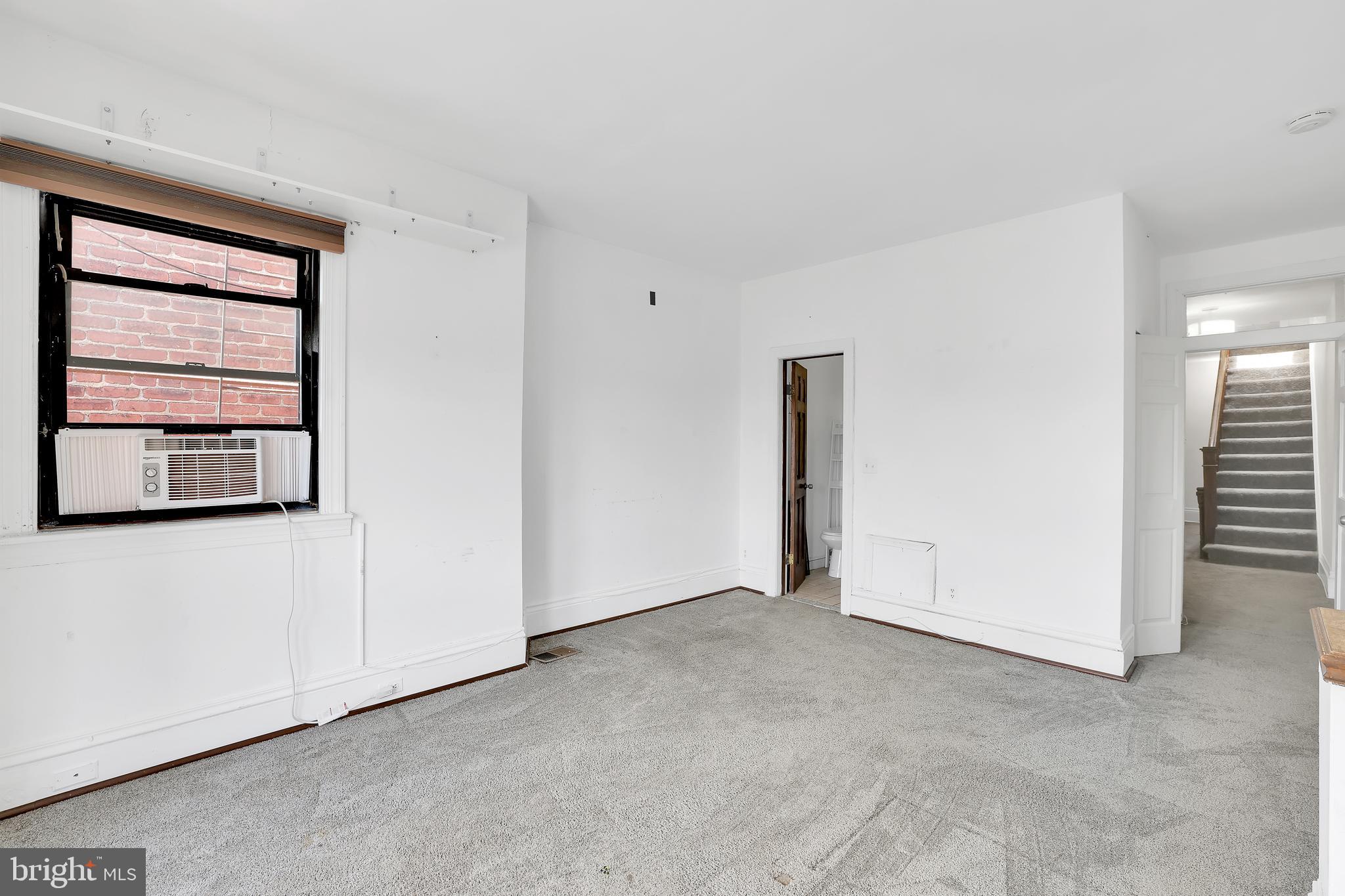 1828 California Street Northwest, Unit A Washington, DC 20009 - Photo 25 of 52 a view of an empty room with a window