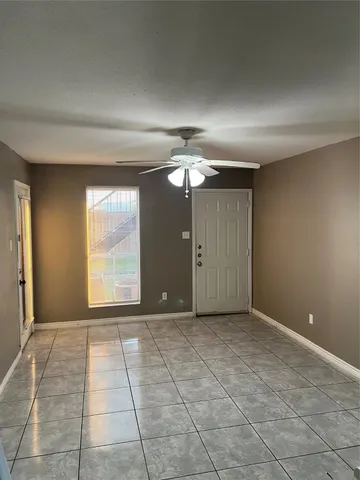 a kitchen with a cabinets and steel appliances