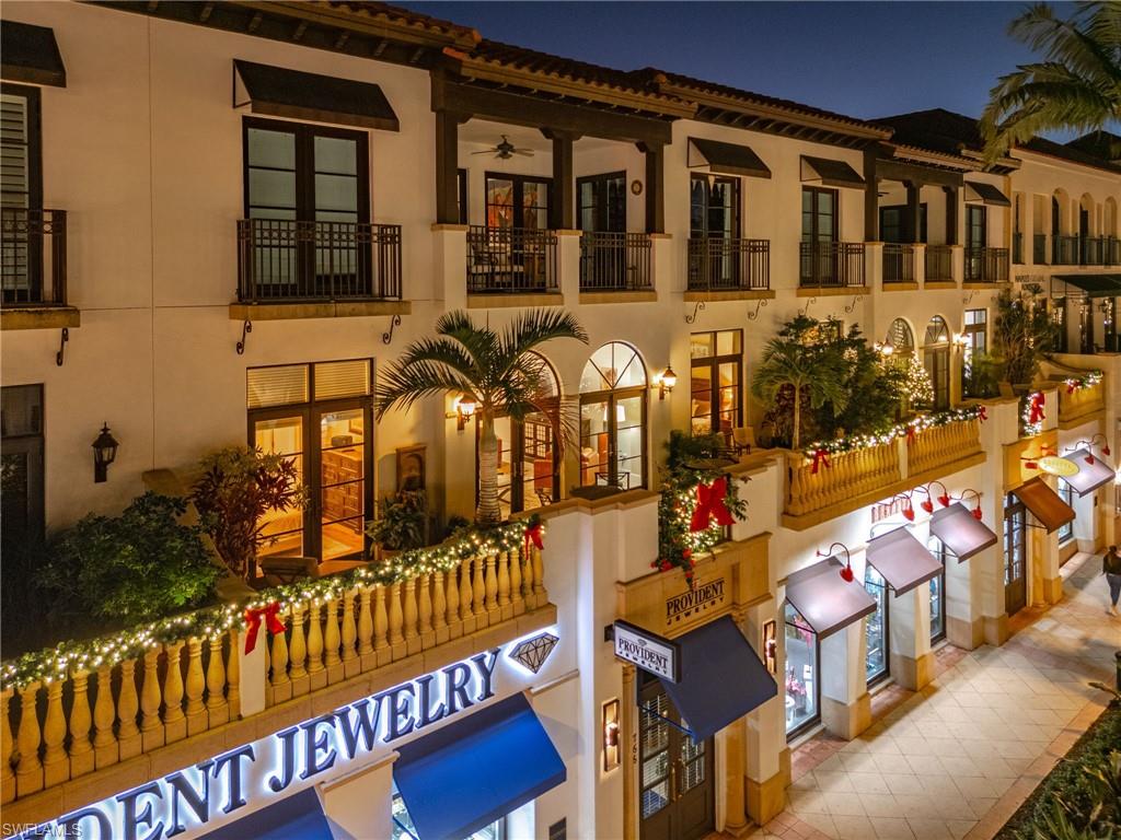 780 5th Avenue South, Unit 3 Naples, FL 34102 - Photo 28 of 28 a view of a brick house with large windows