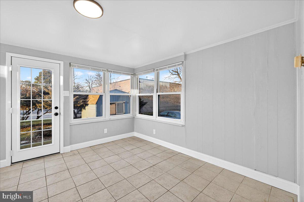 615 13th Street New Castle, DE 19720 - Photo 19 of 39 a view of an empty room with a window