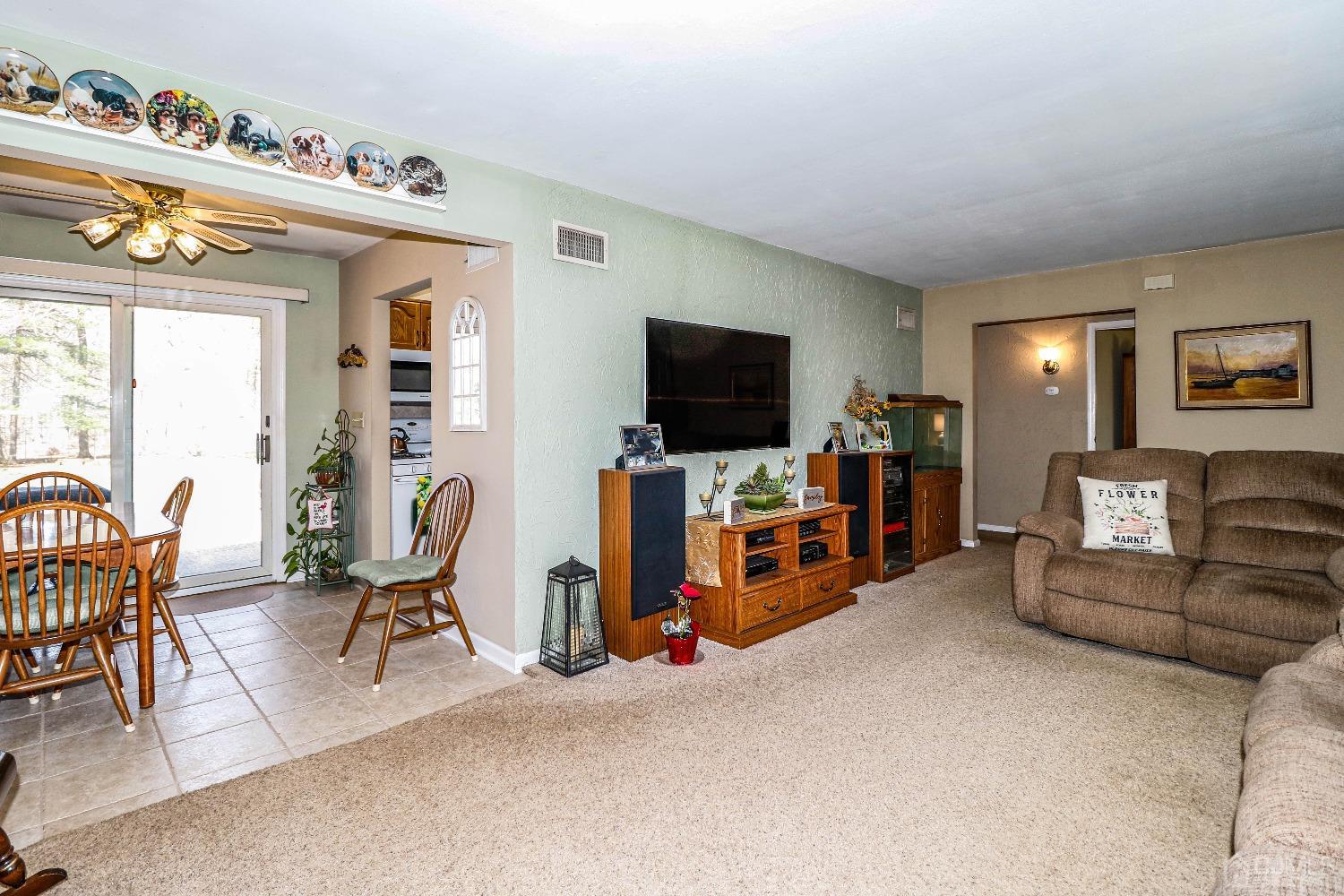 3 Frances Road Edison, NJ 08820 - Photo 11 of 33 a view of a livingroom with furniture and a flat screen tv