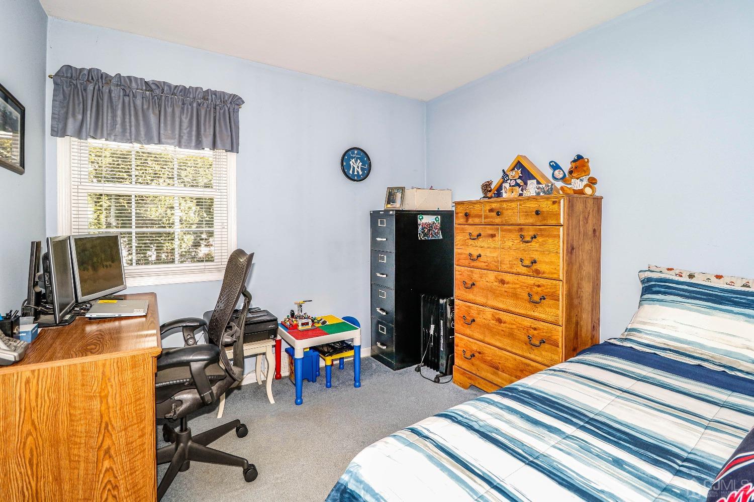 3 Frances Road Edison, NJ 08820 - Photo 24 of 33 a bedroom with a bed and a desk
