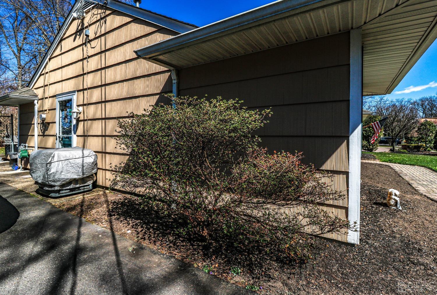 3 Frances Road Edison, NJ 08820 - Photo 5 of 33 a backyard of a house with lots of green space