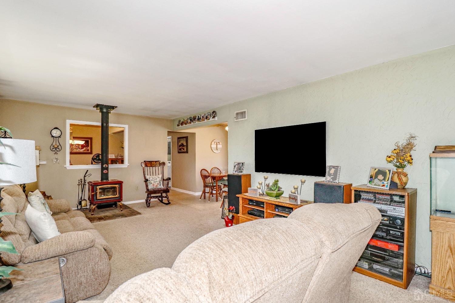 3 Frances Road Edison, NJ 08820 - Photo 8 of 33 a living room with furniture and a flat screen tv