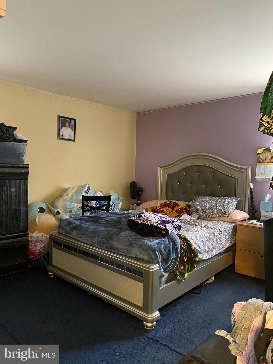 7907 Good Luck Road Lanham, MD 20706 - Photo 12 of 36 a bedroom with a bed and a couch