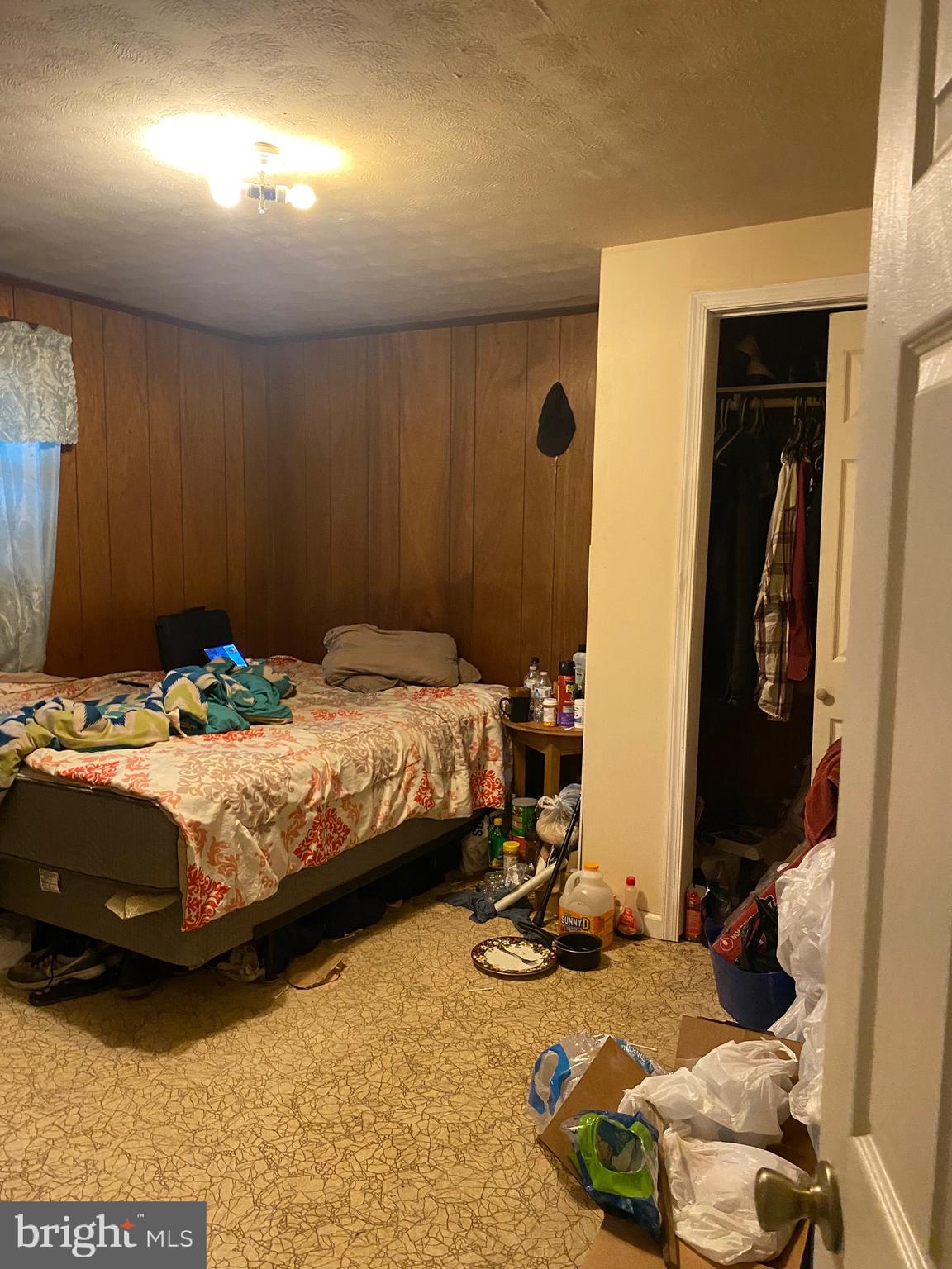 7907 Good Luck Road Lanham, MD 20706 - Photo 19 of 36 a bedroom with a bed and a mirror