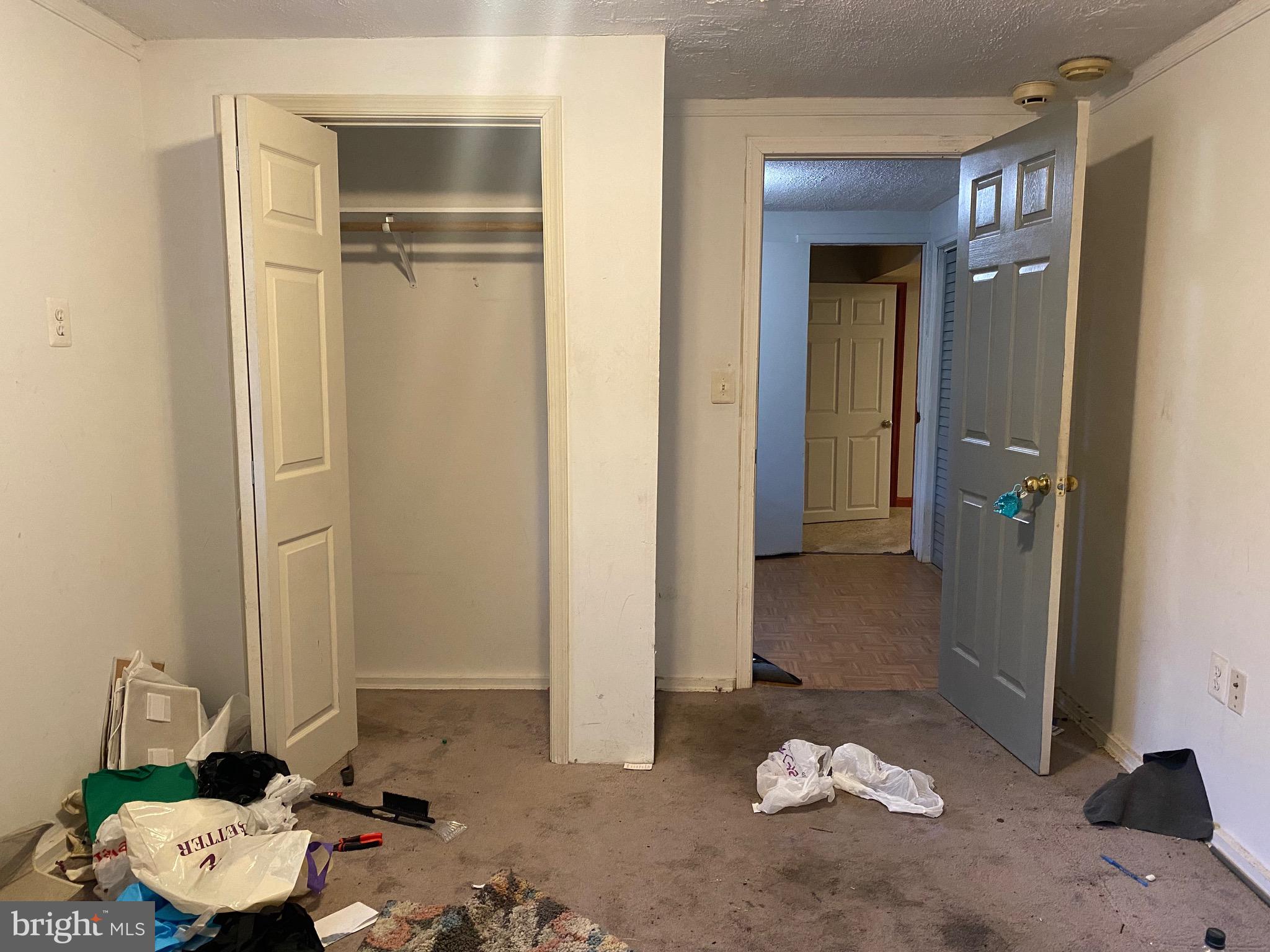 7907 Good Luck Road Lanham, MD 20706 - Photo 26 of 36 a view of a hallway with dining room and wooden floor
