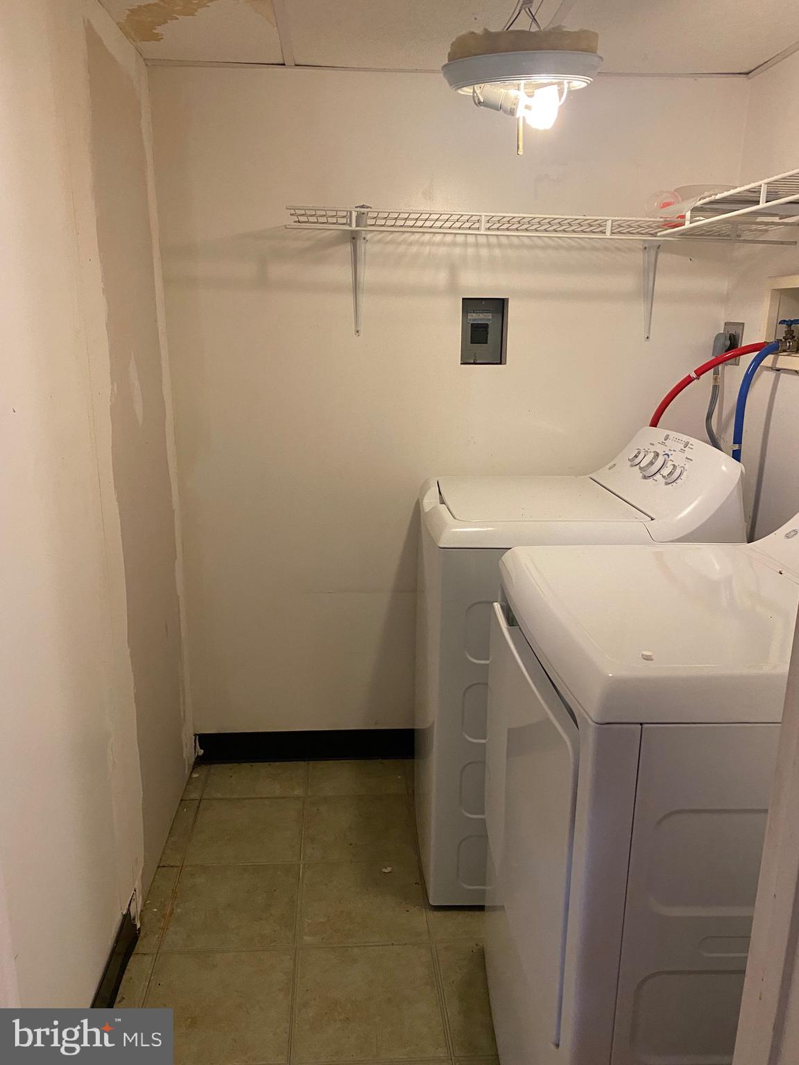 7907 Good Luck Road Lanham, MD 20706 - Photo 28 of 36 a utility room with dryer and washer