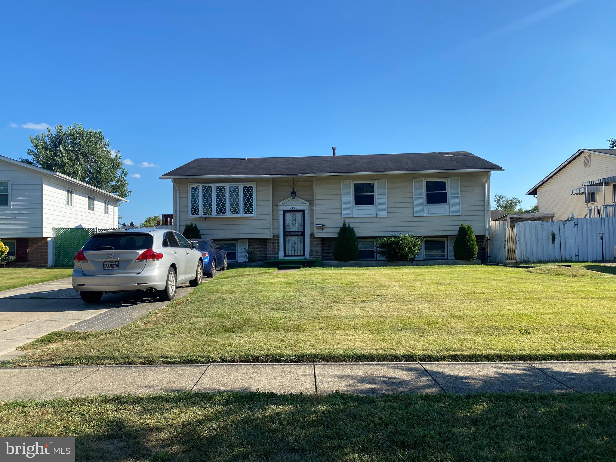 7907 Good Luck Road Lanham, MD 20706 - Photo 36 of 36 a view of a house with backyard and sitting area