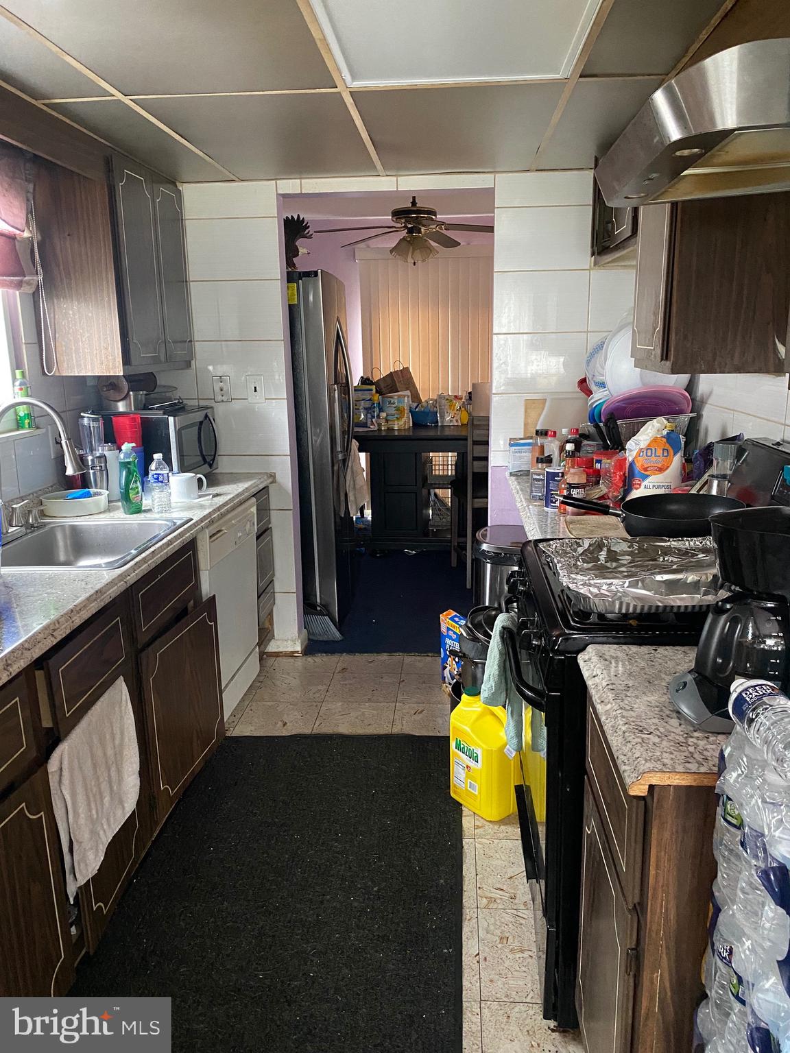 7907 Good Luck Road Lanham, MD 20706 - Photo 4 of 36 a kitchen with a sink appliances and cabinets