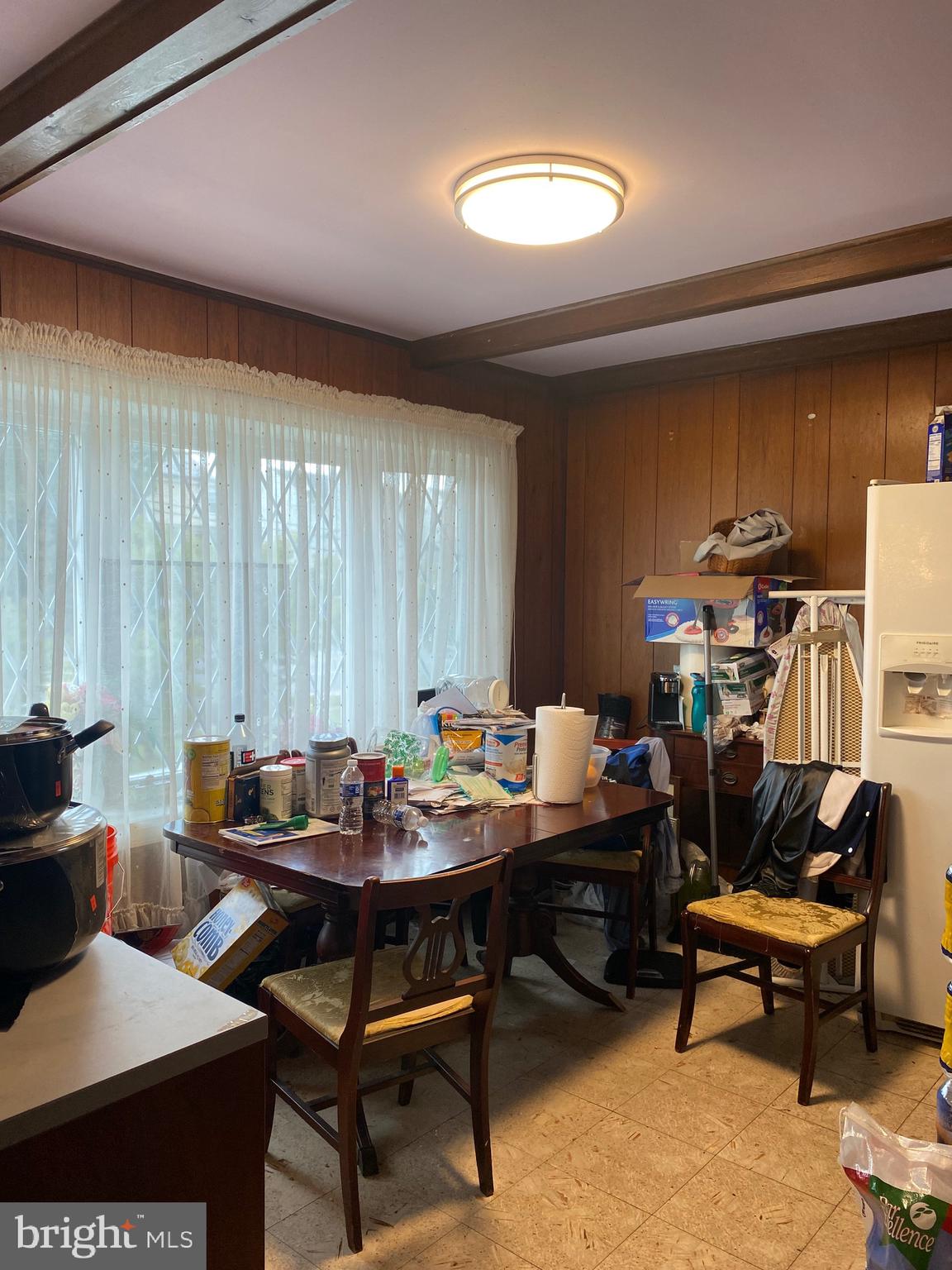 7907 Good Luck Road Lanham, MD 20706 - Photo 8 of 36 a work room with furniture and a potted plant