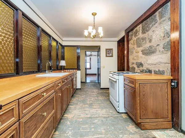a large kitchen with a large window