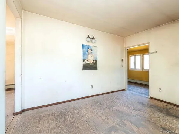an empty room with window