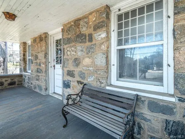 a view of livingroom with furniture and windows