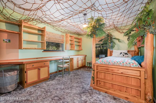 a room with a sink a washer and dryer