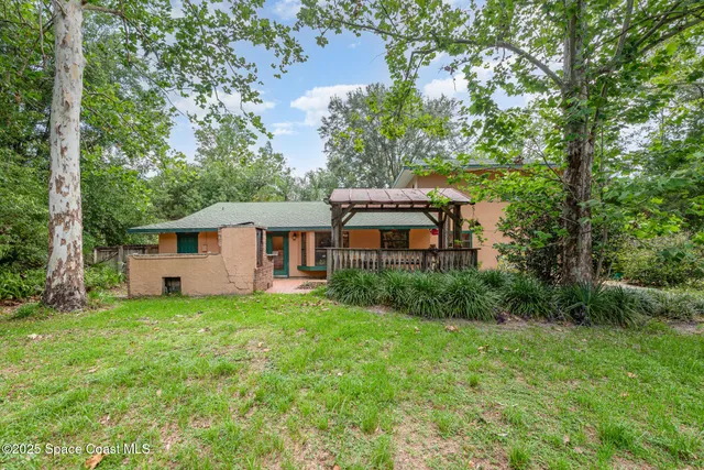 a view of a lake with a house