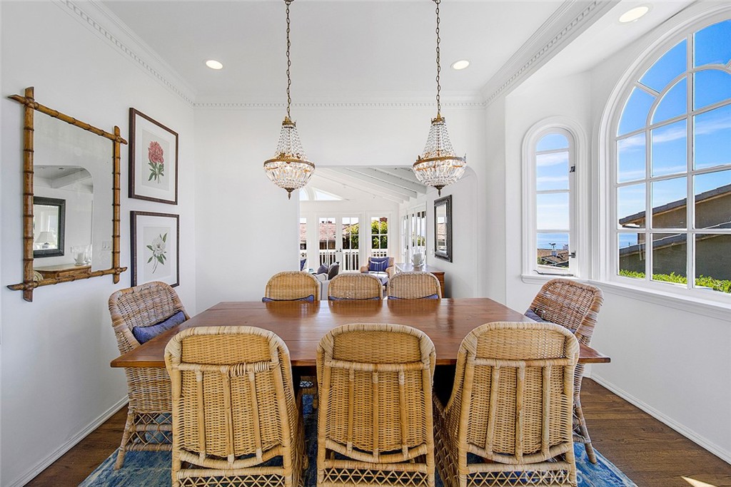 806 Emerald Bay Laguna Beach, CA 92651 - Photo 21 of 33 a view of a dining room with furniture window and wooden floor