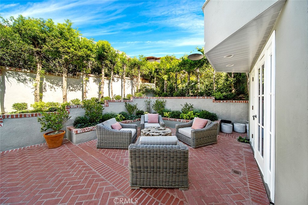 806 Emerald Bay Laguna Beach, CA 92651 - Photo 26 of 33 a view of a patio with couches and potted plants