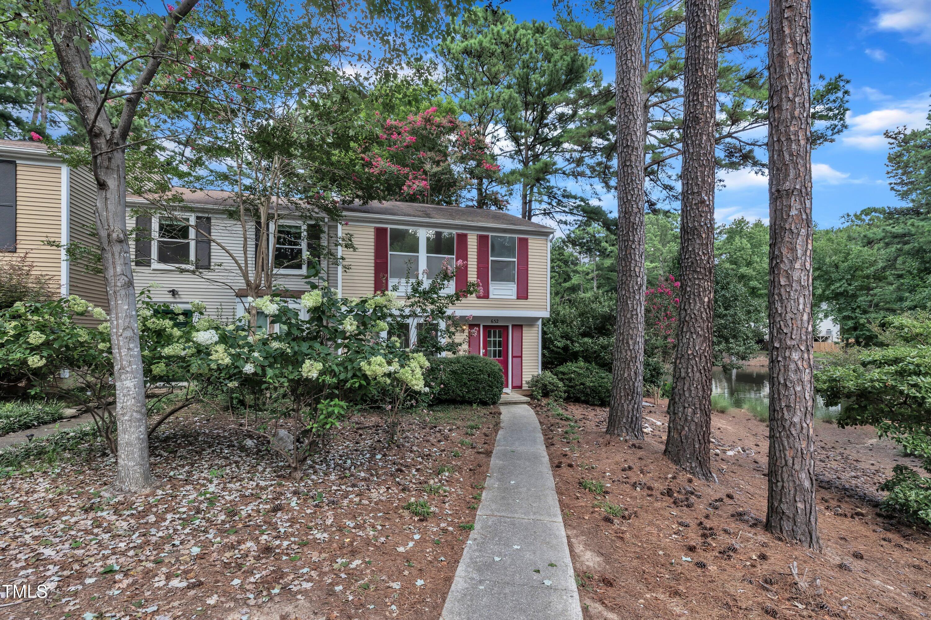 632 Middleton Avenue Cary, NC 27513 - Photo 32 of 34 a front view of a house with garden