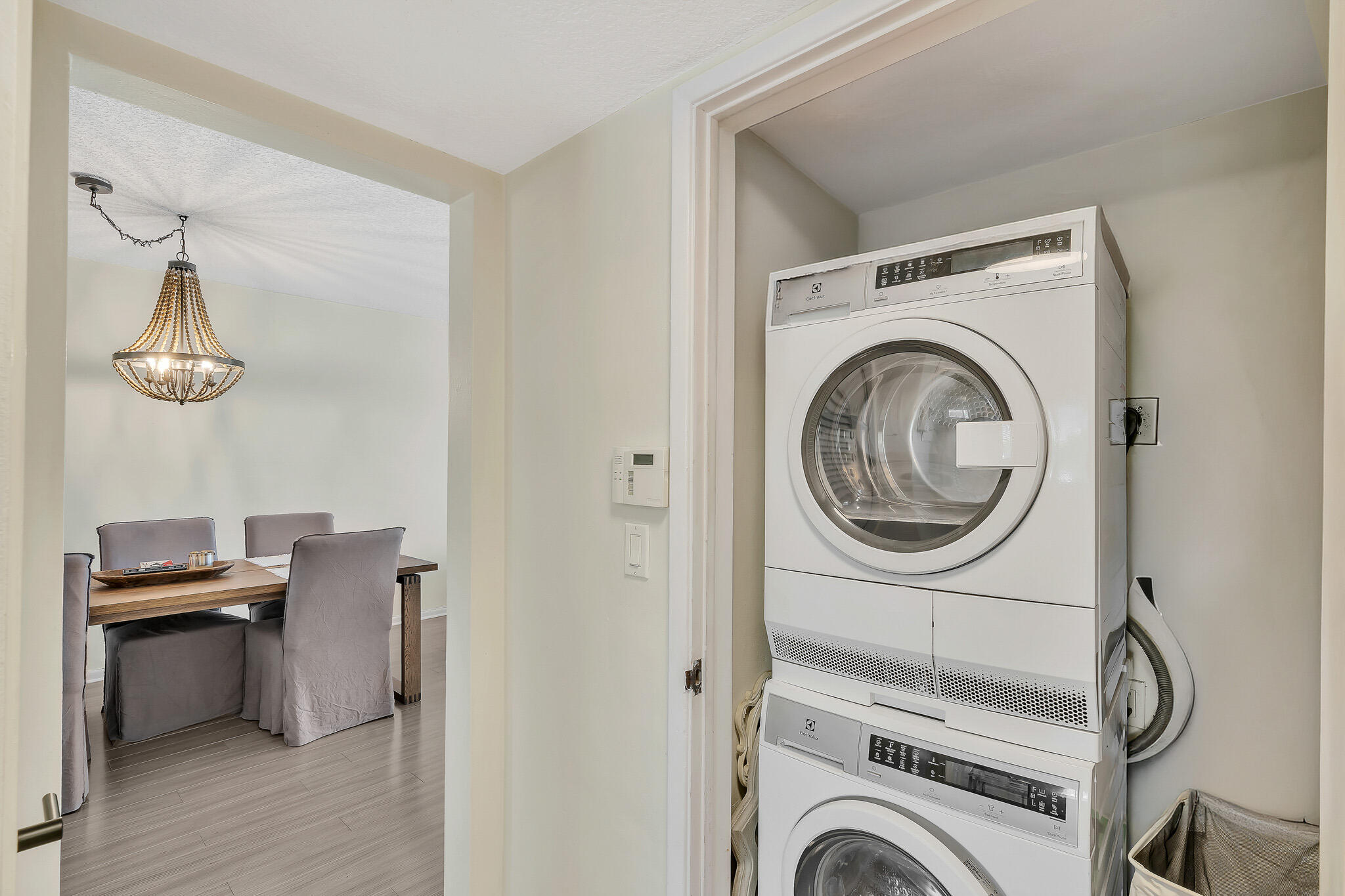 711 Northeast Harbour Terrace, Unit 3090 Boca Raton, FL 33431 - Photo 17 of 53 a view of livingroom with washer and dryer