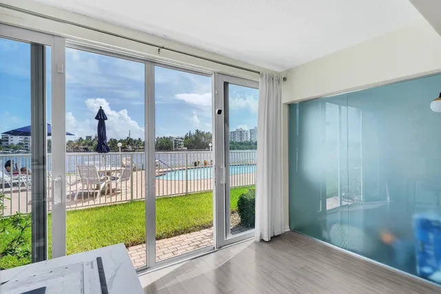 a view of a backyard with a garden and plants