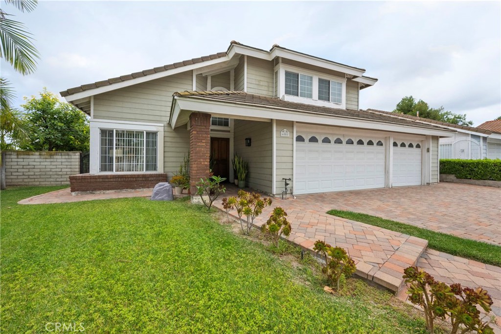 605 Bronco Way Walnut, CA 91789 - Photo 69 of 69 a front view of a house with garden