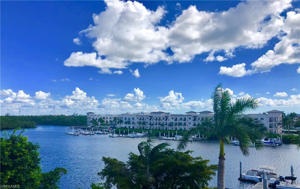 451 Bayfront Place, Unit 5311 Naples, FL 34102 - Photo 6 of 38 a view of a lake in middle of the city